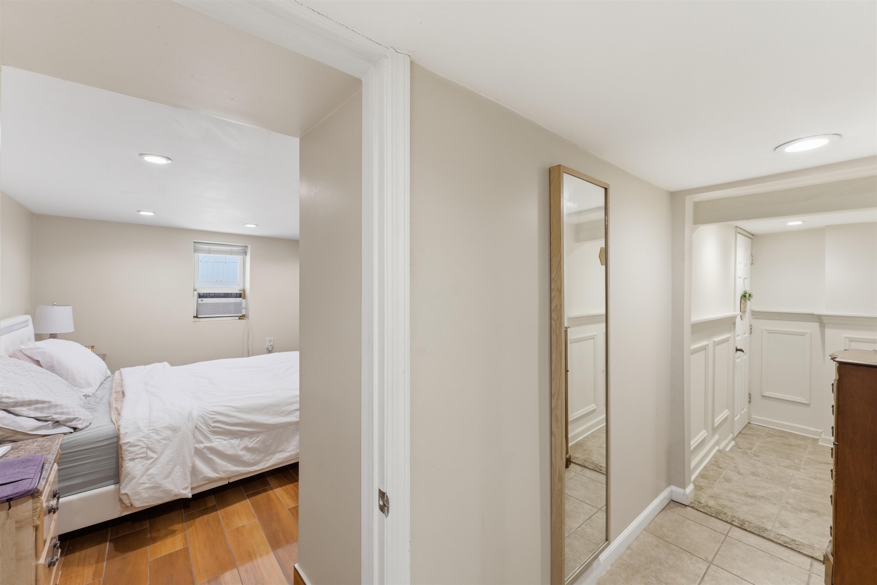 921 Paterson Plank Road North Bergen, NJ 07047 - Photo 16 of 50 a bedroom with a bed and walk in closet