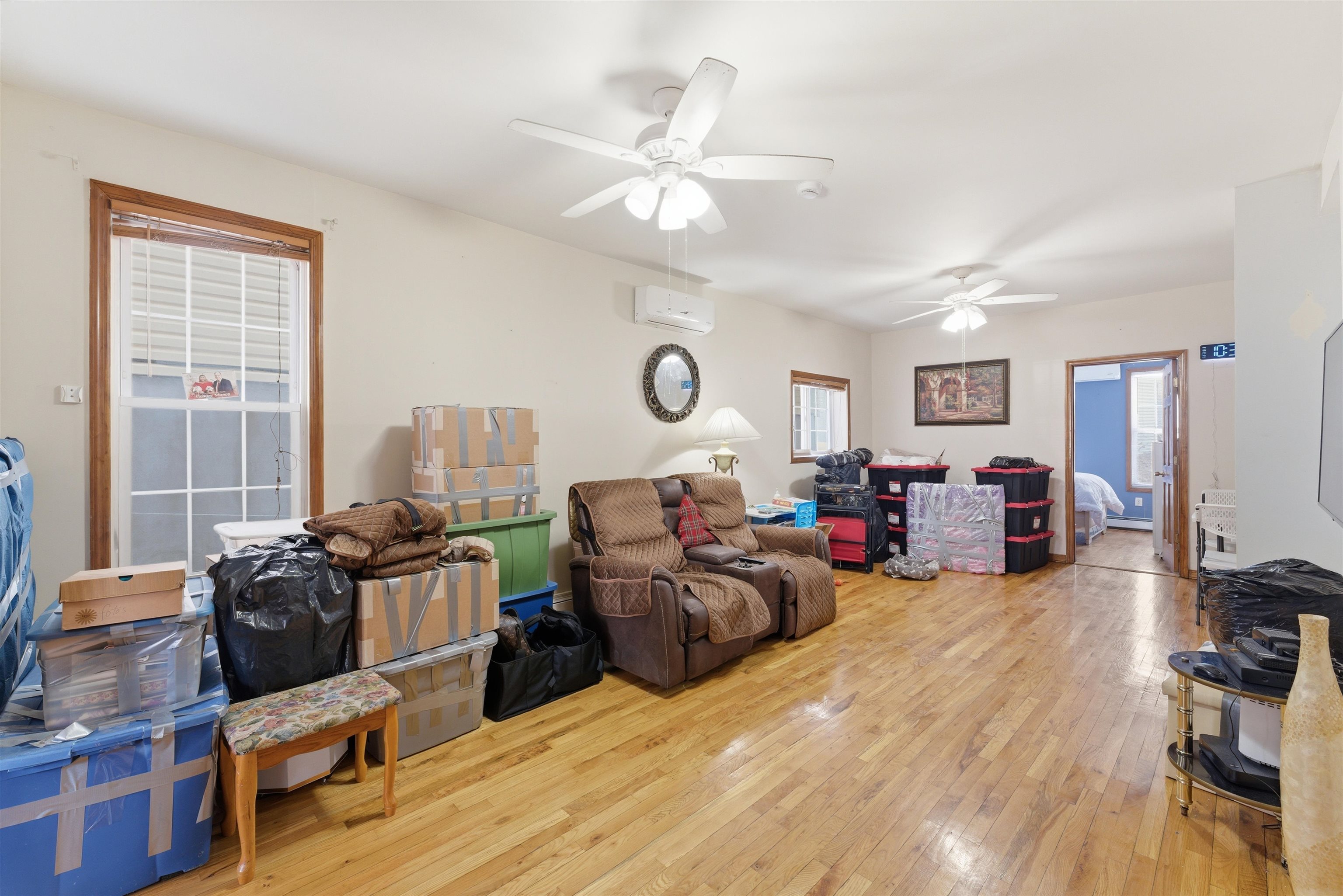 921 Paterson Plank Road North Bergen, NJ 07047 - Photo 25 of 50 a living room with furniture and a large window