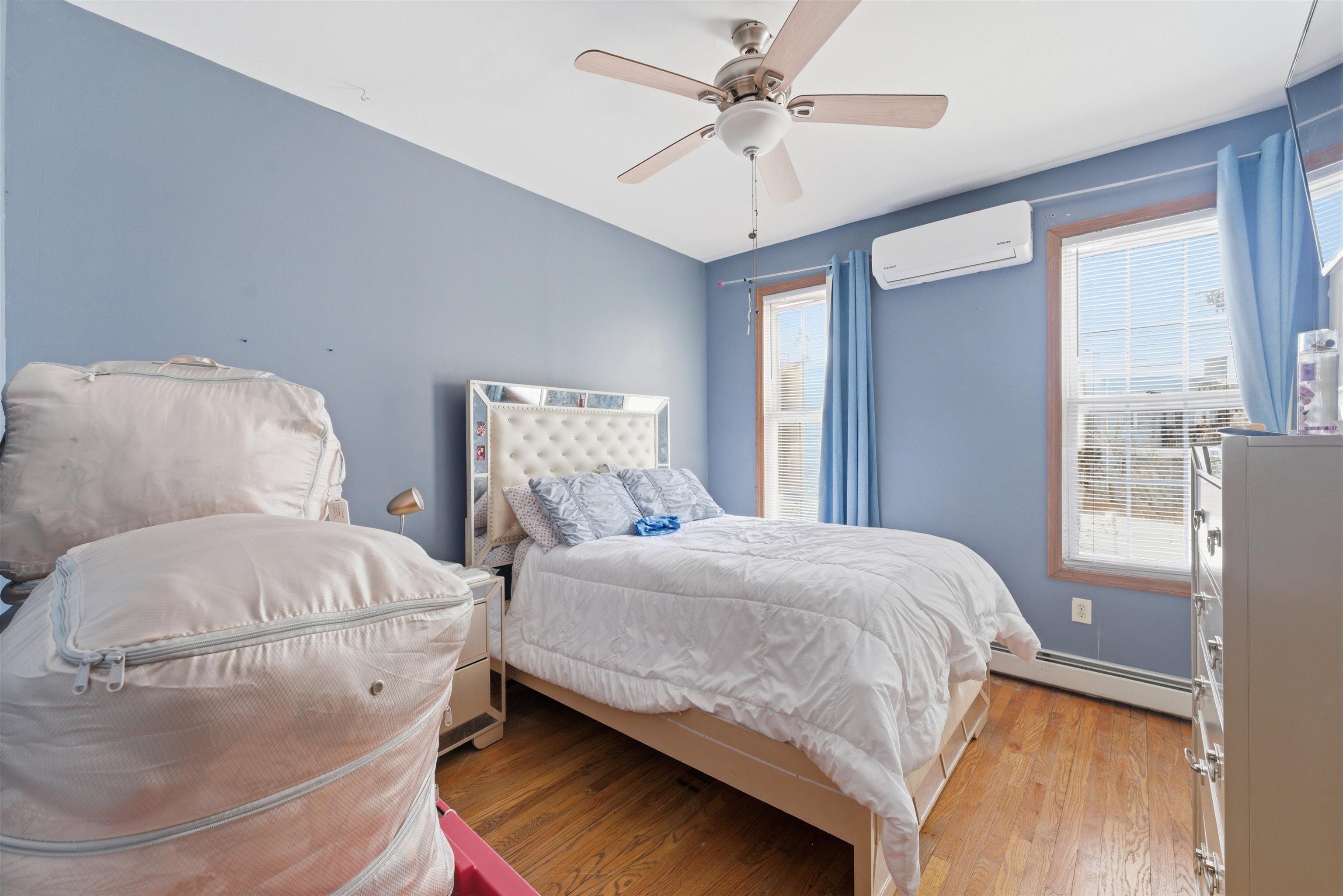 921 Paterson Plank Road North Bergen, NJ 07047 - Photo 27 of 50 a bedroom with bed and window