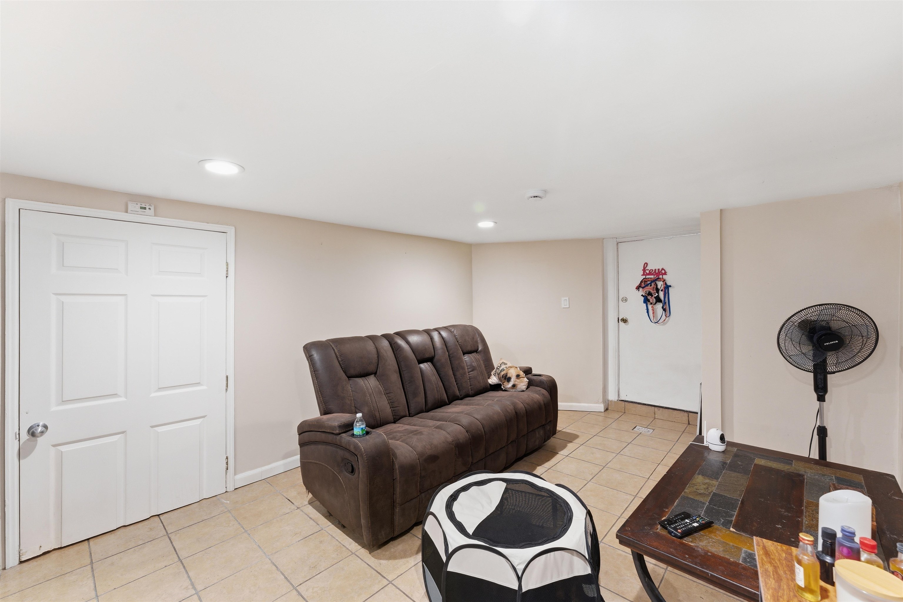 921 Paterson Plank Road North Bergen, NJ 07047 - Photo 44 of 50 a living room with furniture and a window