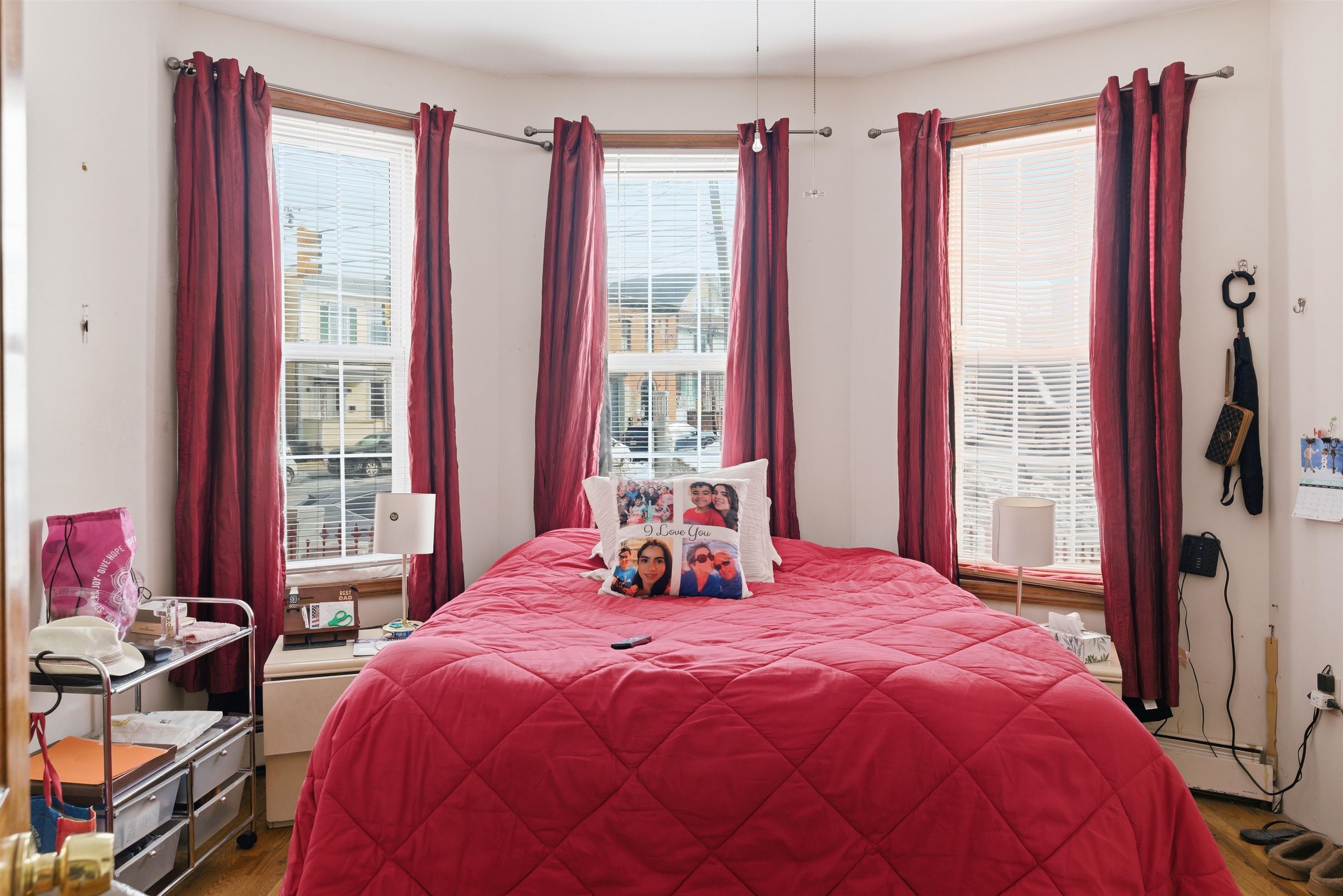 921 Paterson Plank Road North Bergen, NJ 07047 - Photo 48 of 50 a bedroom with a bed and a large window