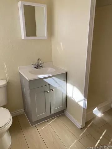 a bathroom with a sink and a toilet
