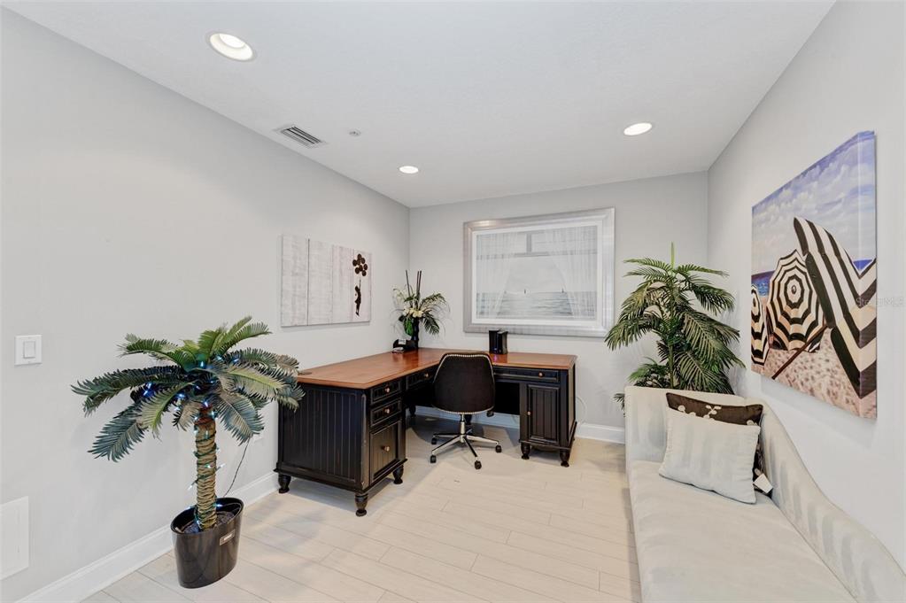 611 Riviera Dunes Way, Unit 304 Palmetto, FL 34221 - Photo 12 of 30 a workspace with furniture and window