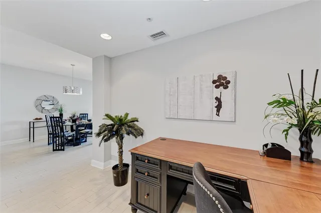 a view of kitchen with furniture and potted plant