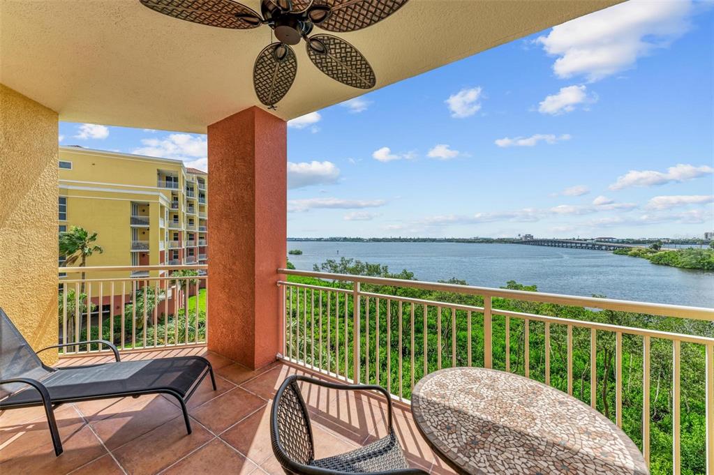 611 Riviera Dunes Way, Unit 304 Palmetto, FL 34221 - Photo 23 of 30 a view of a balcony with furniture