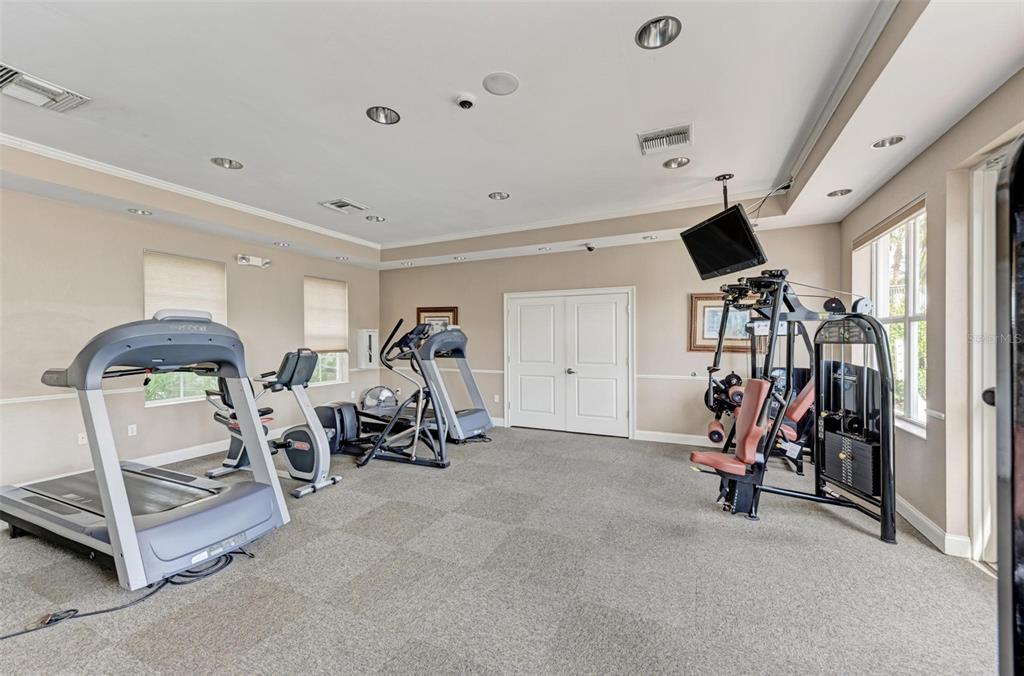 611 Riviera Dunes Way, Unit 304 Palmetto, FL 34221 - Photo 30 of 30 a view of a room with gym equipment