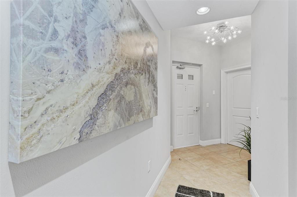 611 Riviera Dunes Way, Unit 304 Palmetto, FL 34221 - Photo 3 of 30 a bathroom with a bathtub and shower