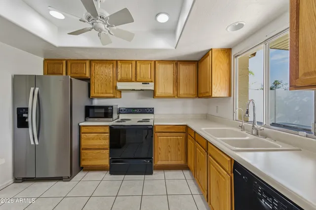 a view of an empty room and fire place