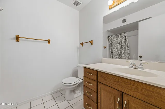 an aerial view of a residential houses with outdoor space