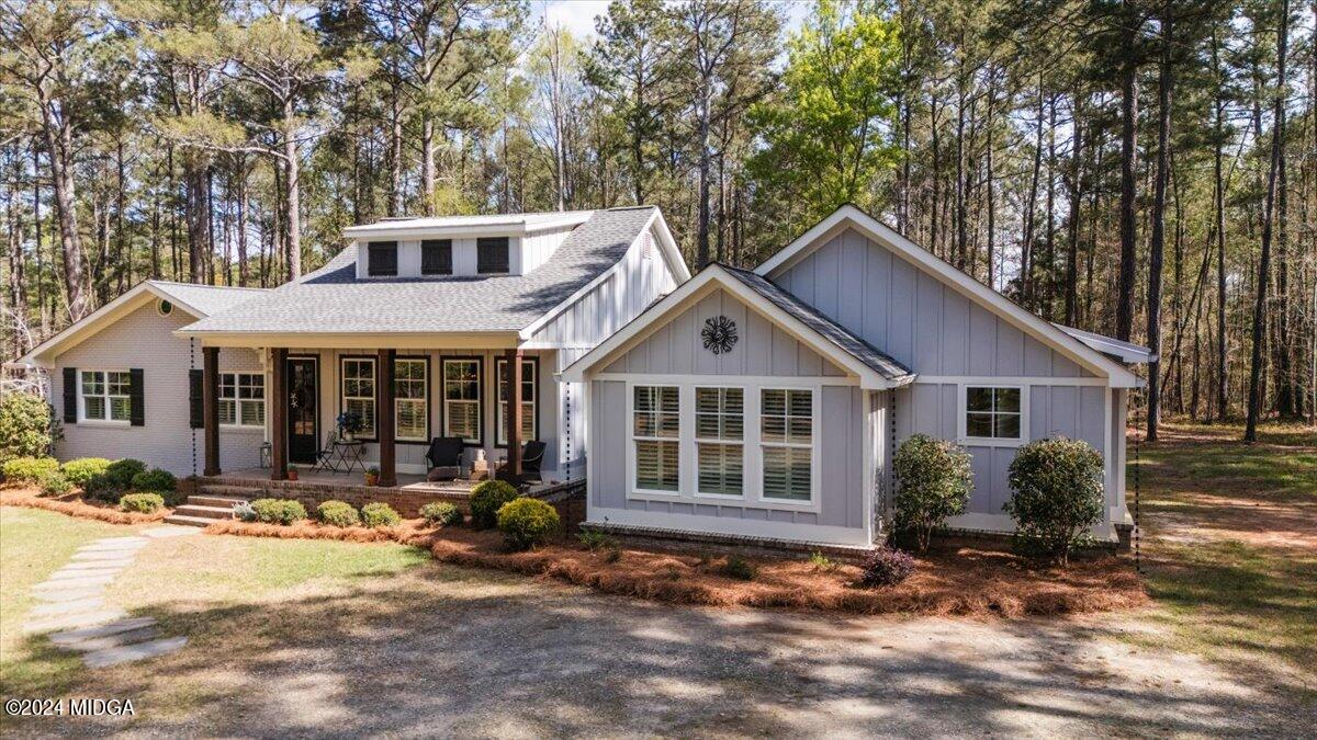 280 Joe Chambers Road Forsyth, GA 31029 - Photo 37 of 55 a view of a house with yard and sitting area