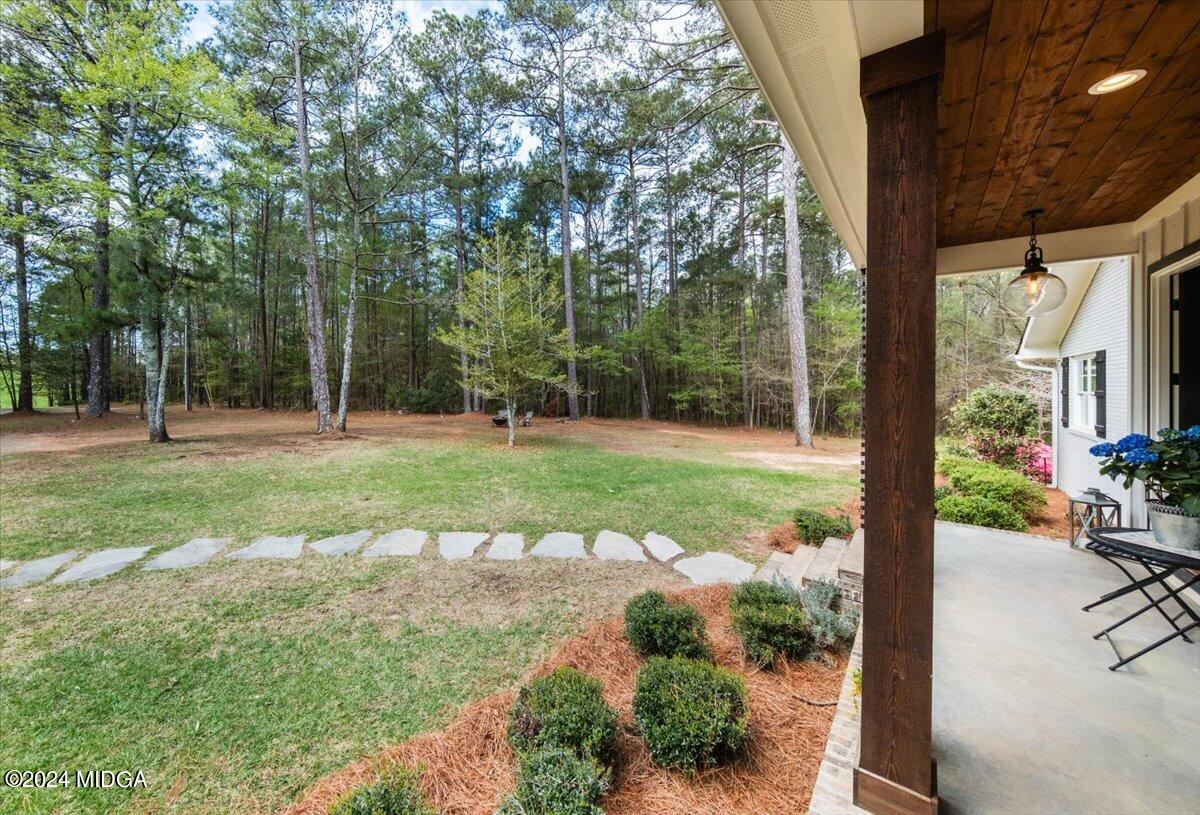 280 Joe Chambers Road Forsyth, GA 31029 - Photo 55 of 55 a view of a backyard with garden