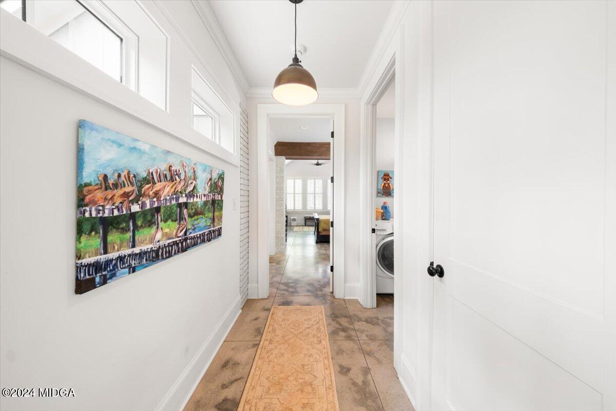 280 Joe Chambers Road Forsyth, GA 31029 - Photo 9 of 55 a view of a hallway with wooden floor and a living room