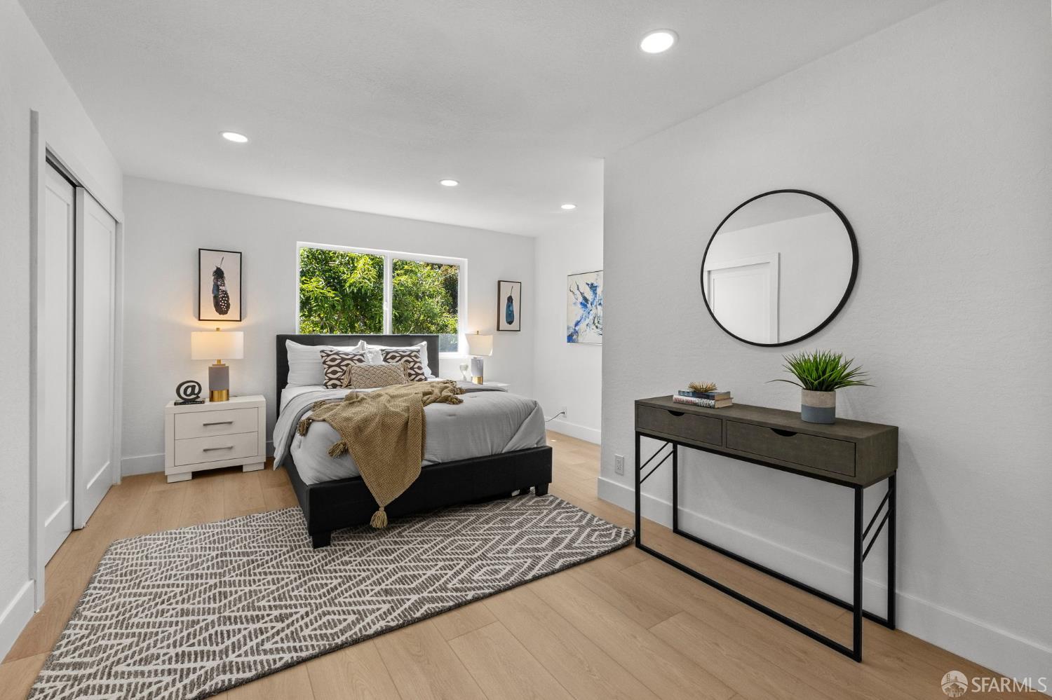 226 Rutledge Street San Francisco, CA 94110 - Photo 11 of 44 a bed room with a bed and a window