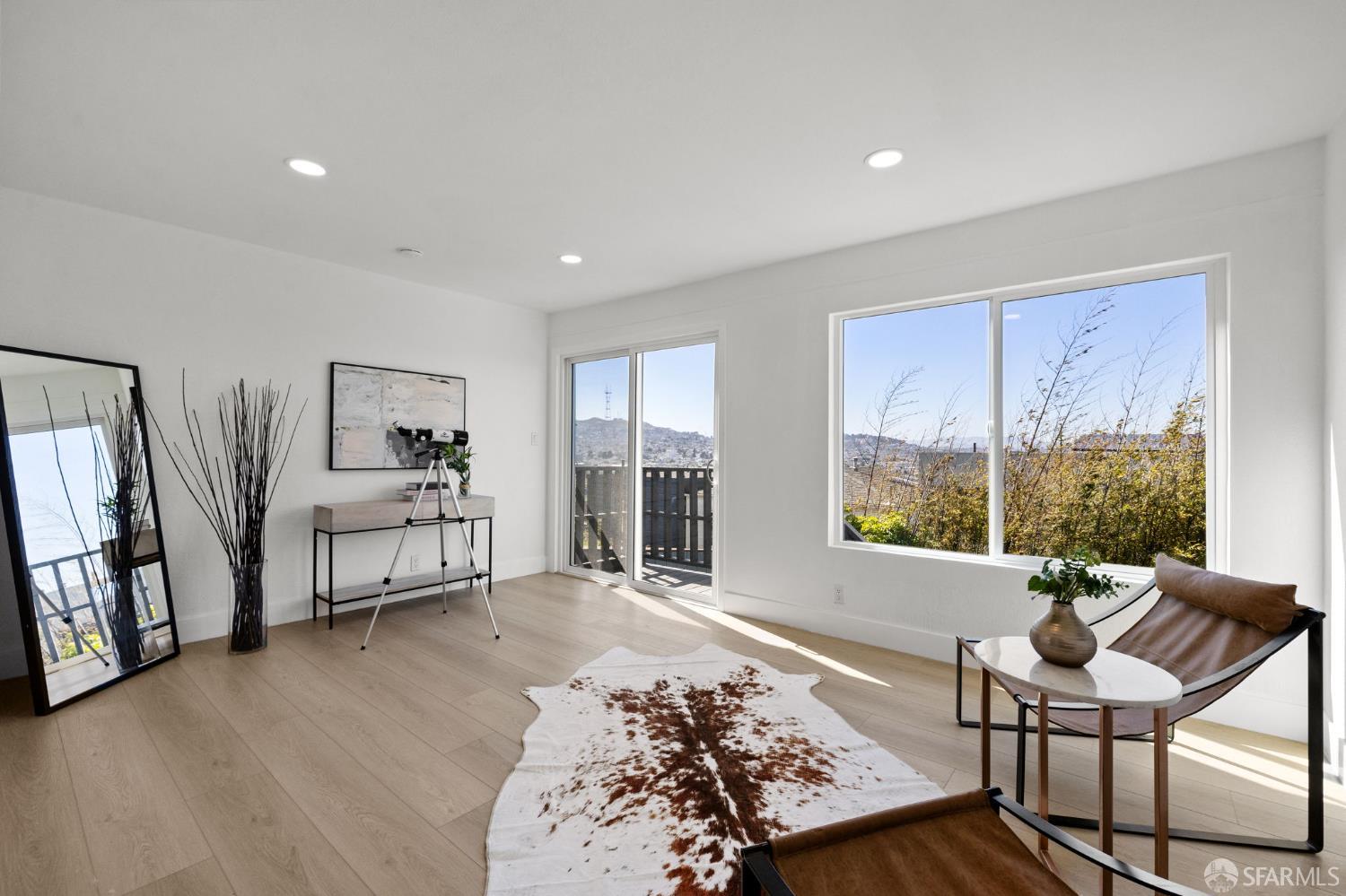 226 Rutledge Street San Francisco, CA 94110 - Photo 14 of 44 a living room with furniture and a window
