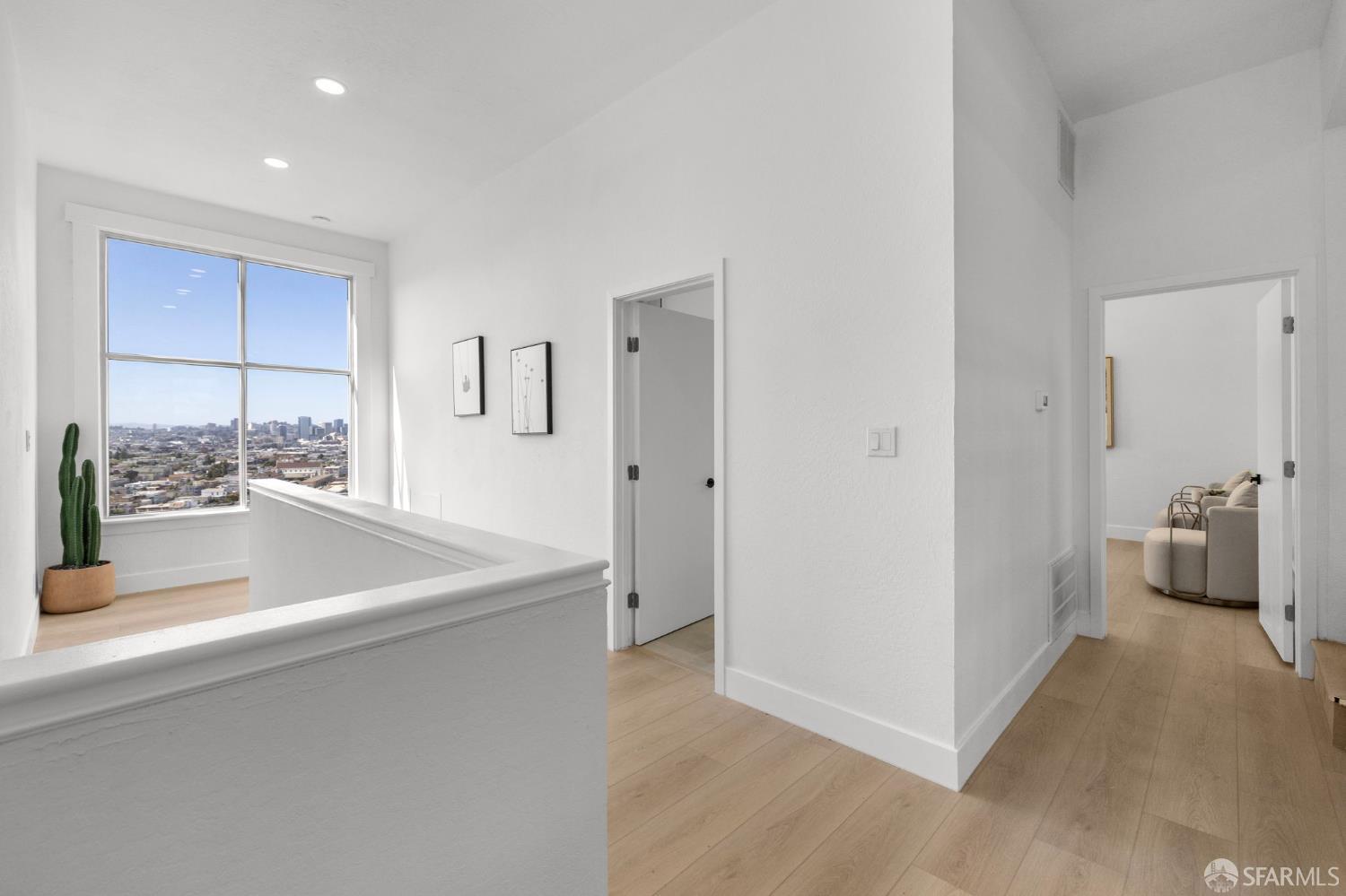 226 Rutledge Street San Francisco, CA 94110 - Photo 18 of 44 a view of a kitchen with a sink and a refrigerator