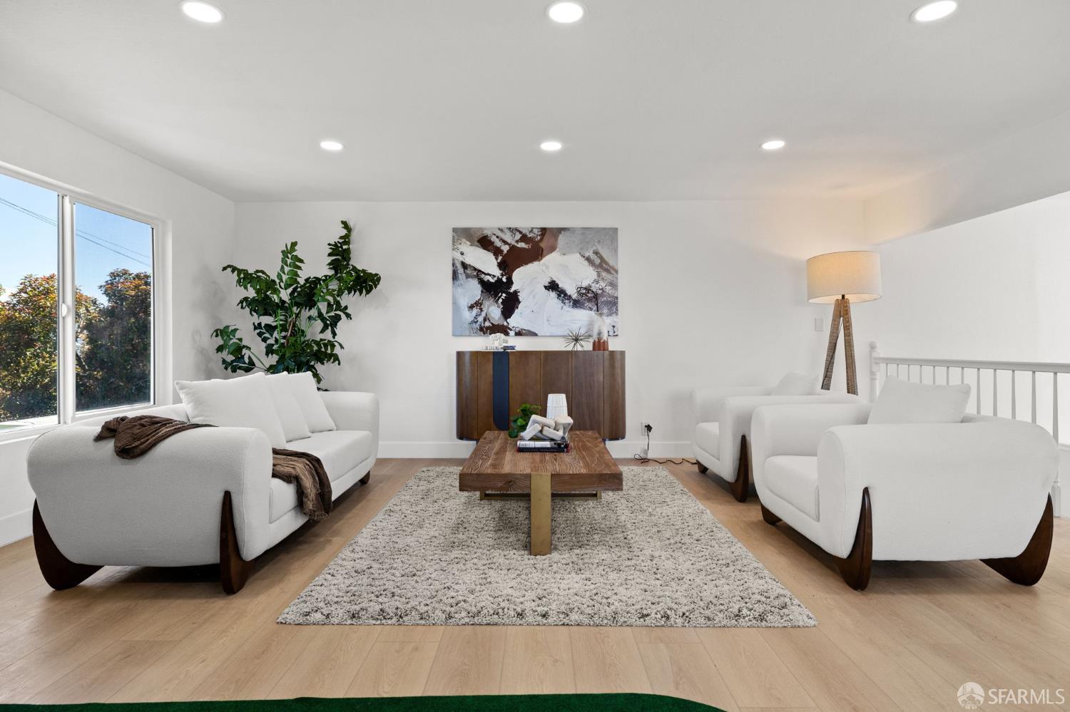 226 Rutledge Street San Francisco, CA 94110 - Photo 21 of 44 a living room with furniture and a couch