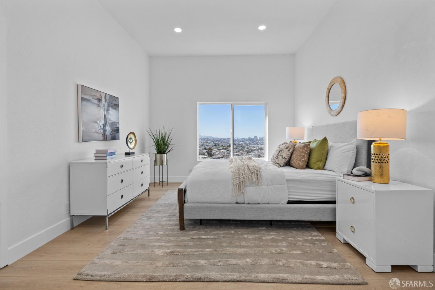 226 Rutledge Street San Francisco, CA 94110 - Photo 26 of 44 a large white bed in a white room