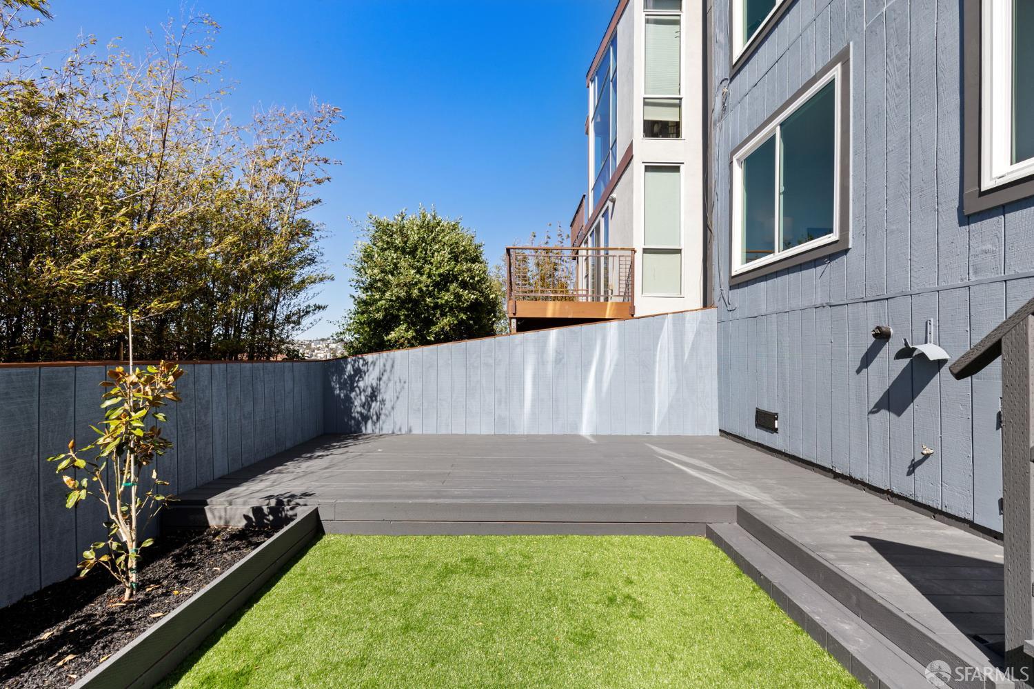 226 Rutledge Street San Francisco, CA 94110 - Photo 39 of 44 a view of a backyard with sitting area