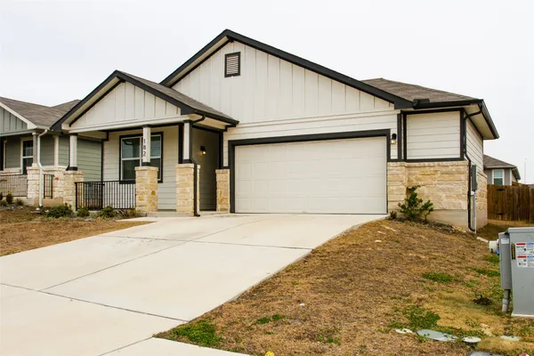 a front view of a house with a porch