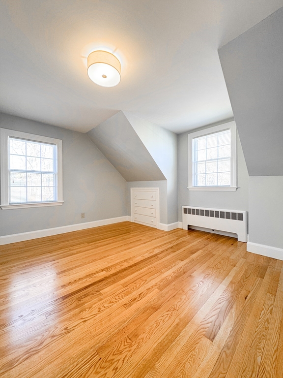40 Walter Street, Unit 1 Lynn, MA 01902 - Photo 18 of 40 an empty room with wooden floor and windows