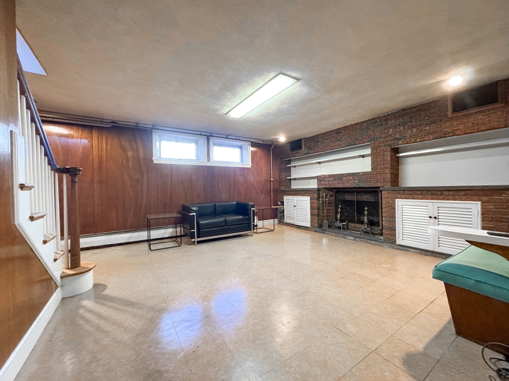 40 Walter Street, Unit 1 Lynn, MA 01902 - Photo 33 of 40 a view of kitchen with furniture and a fireplace