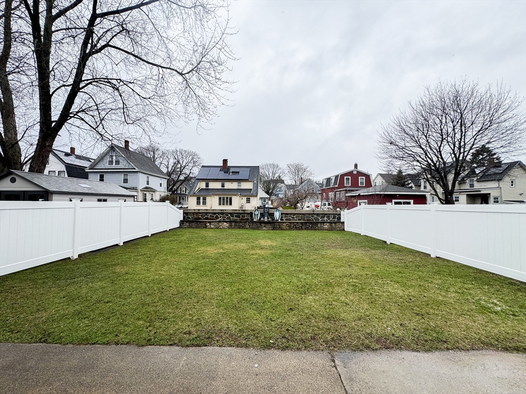 40 Walter Street, Unit 1 Lynn, MA 01902 - Photo 38 of 40 a view of a swimming pool with a yard
