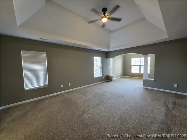 a bathroom with a double vanity sink mirror and shower