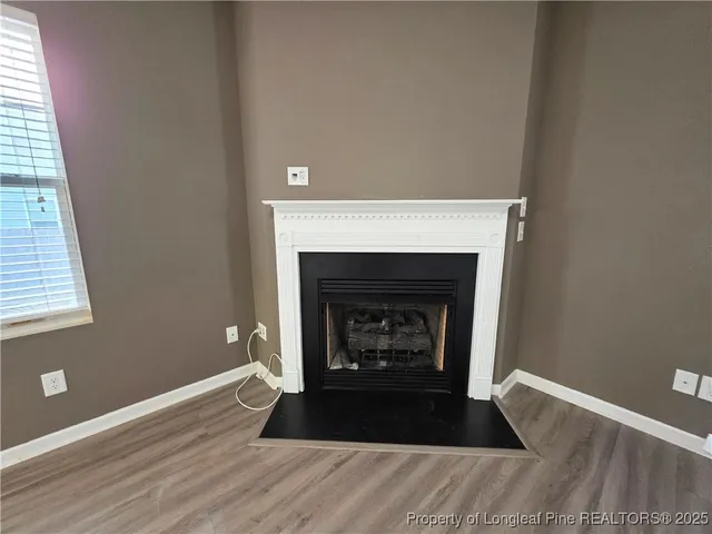 a living room with a fireplace