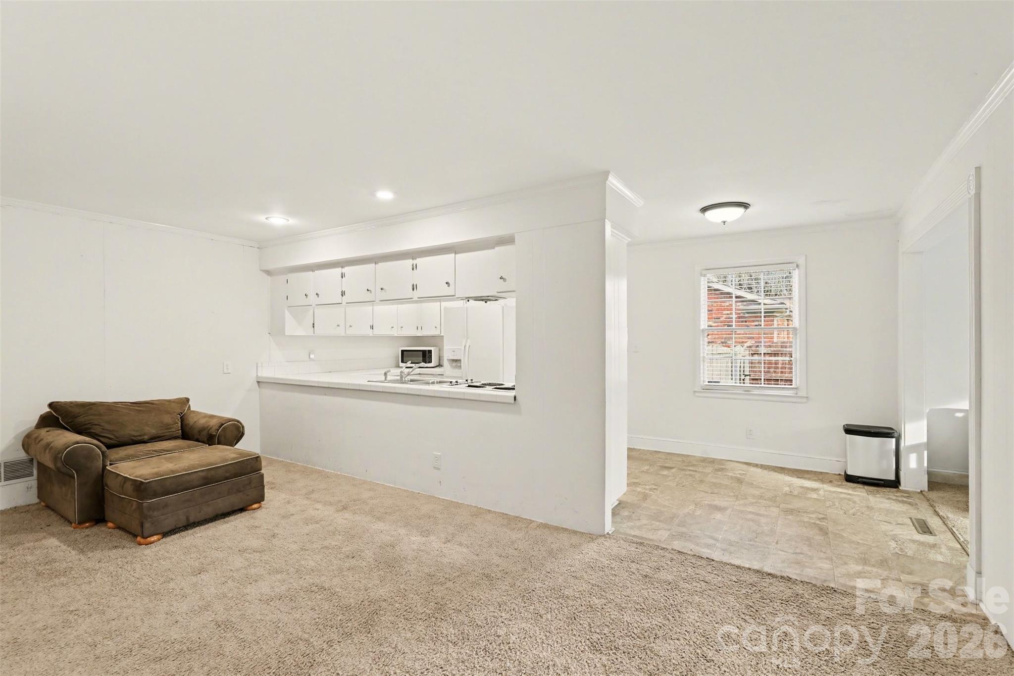 3101 Eastburn Road Charlotte, NC 28210 - Photo 15 of 31 a living room with furniture and a window