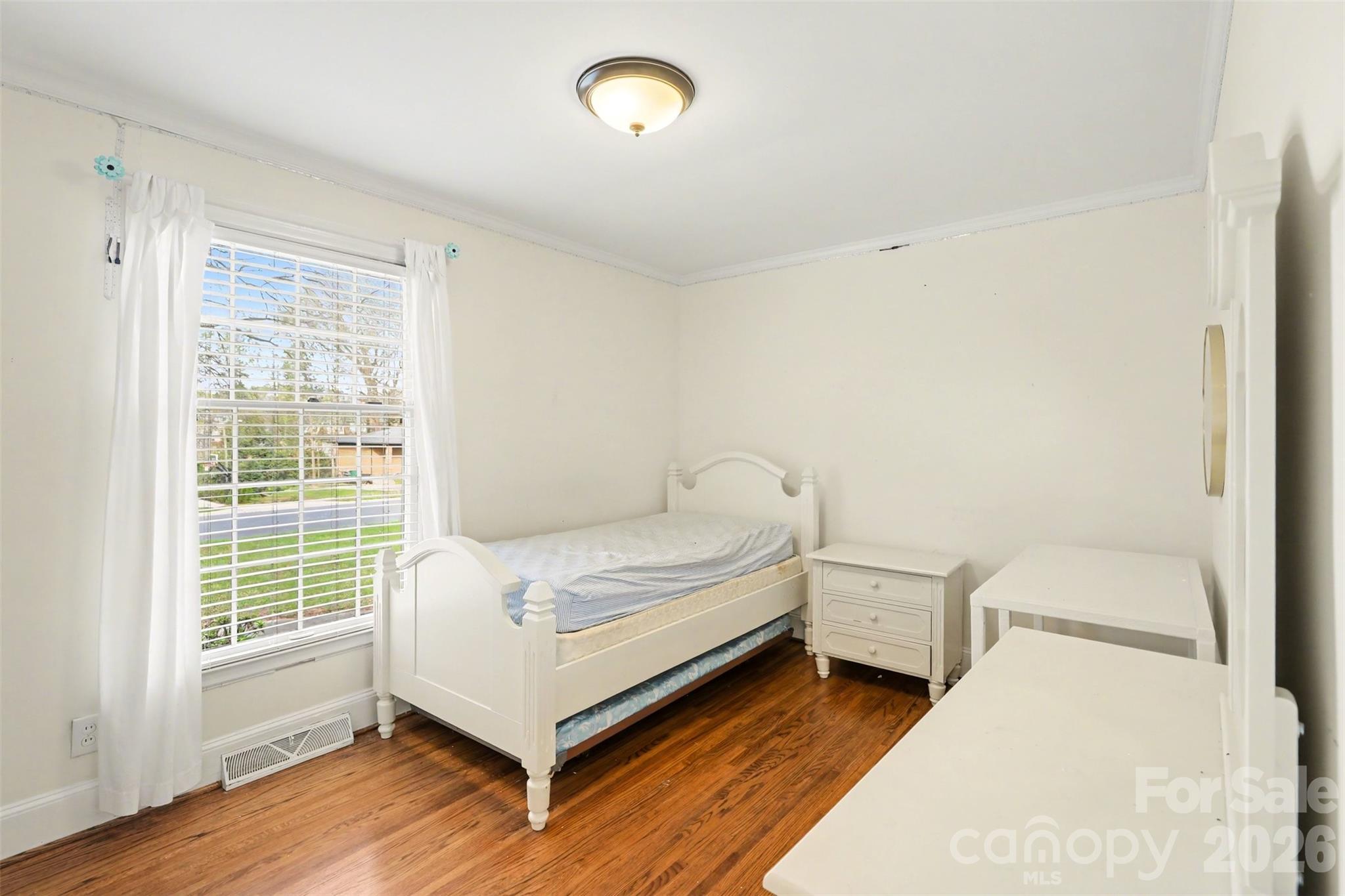 3101 Eastburn Road Charlotte, NC 28210 - Photo 20 of 31 a bedroom with a bed and a window