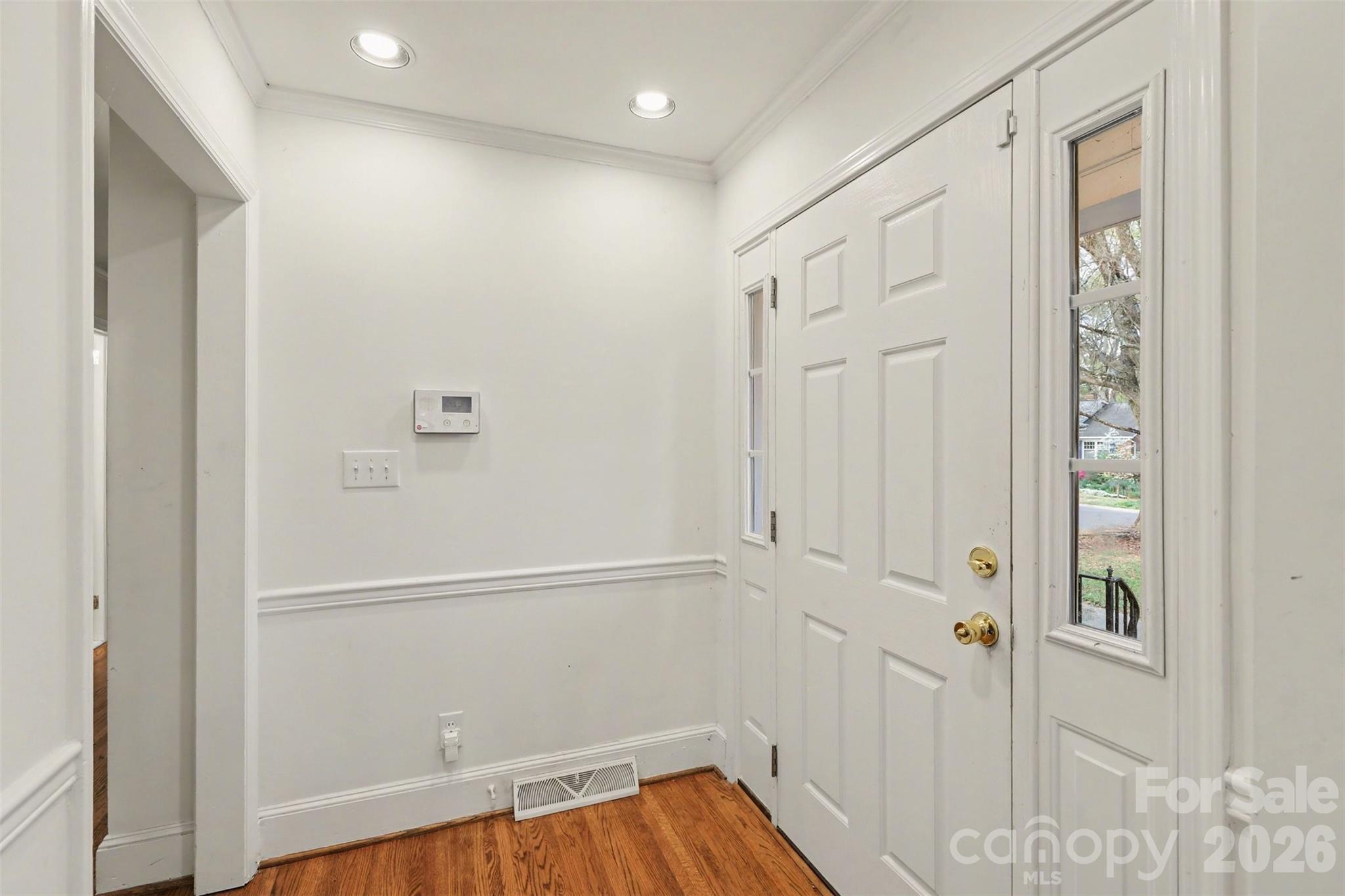 3101 Eastburn Road Charlotte, NC 28210 - Photo 2 of 31 a view of a hallway with wooden floor