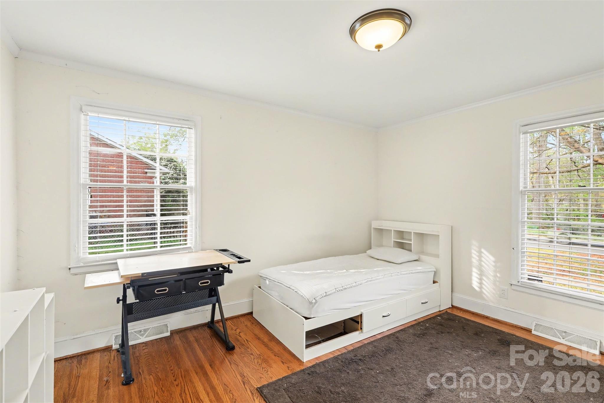 3101 Eastburn Road Charlotte, NC 28210 - Photo 22 of 31 a bedroom with a bed and a window