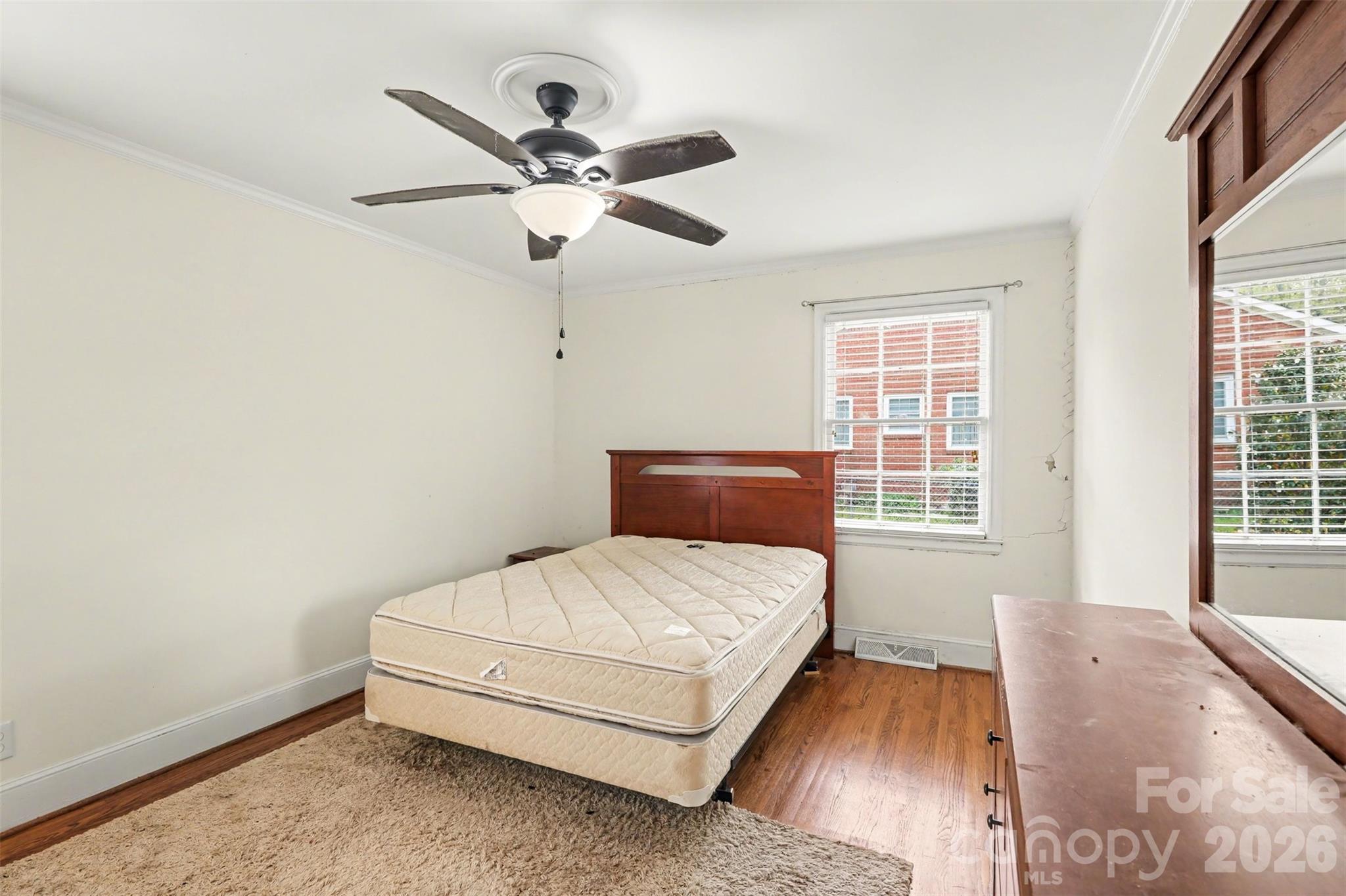 3101 Eastburn Road Charlotte, NC 28210 - Photo 24 of 31 a bedroom with a bed and window