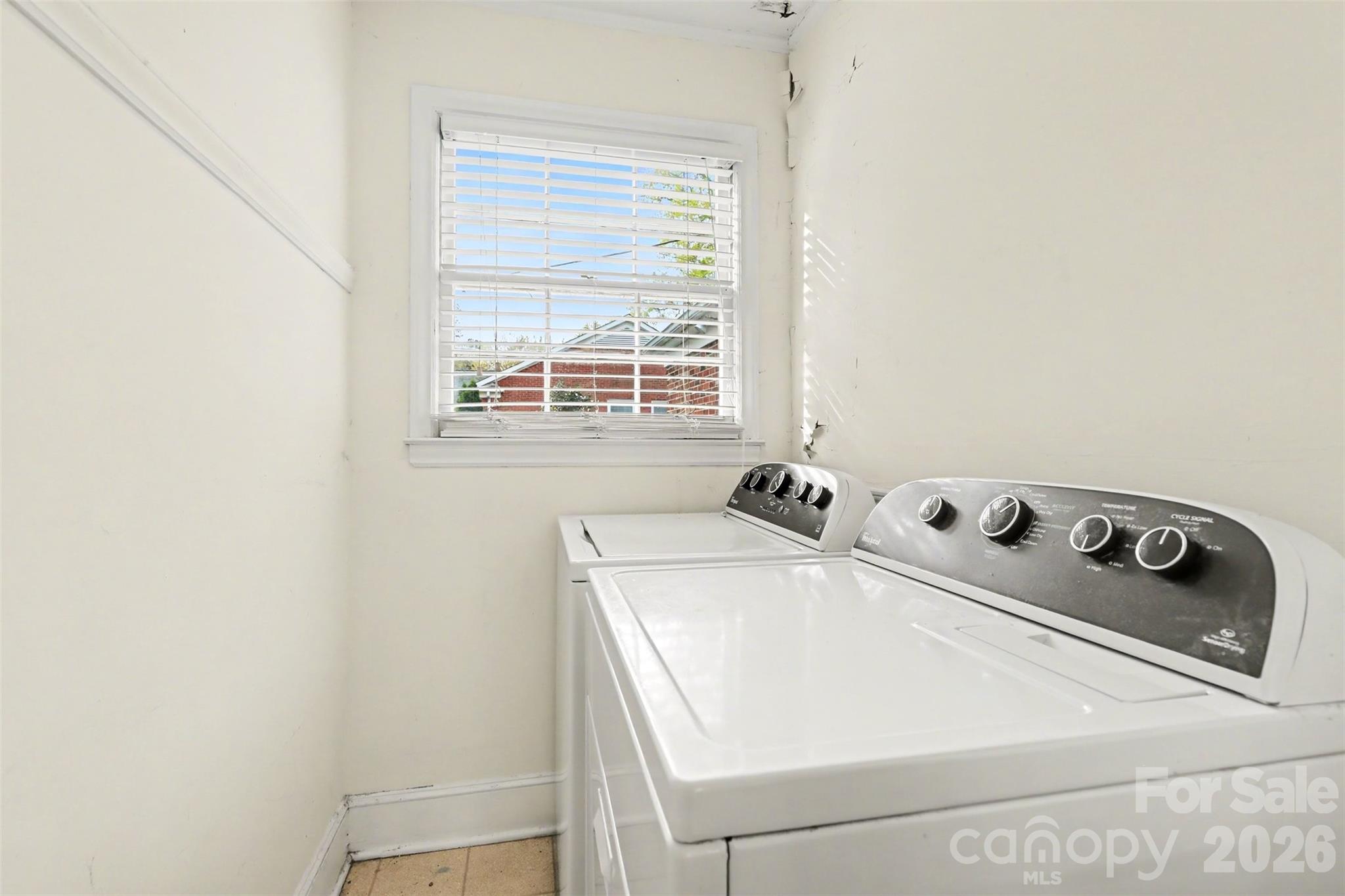 3101 Eastburn Road Charlotte, NC 28210 - Photo 29 of 31 a utility room with dryer and washer