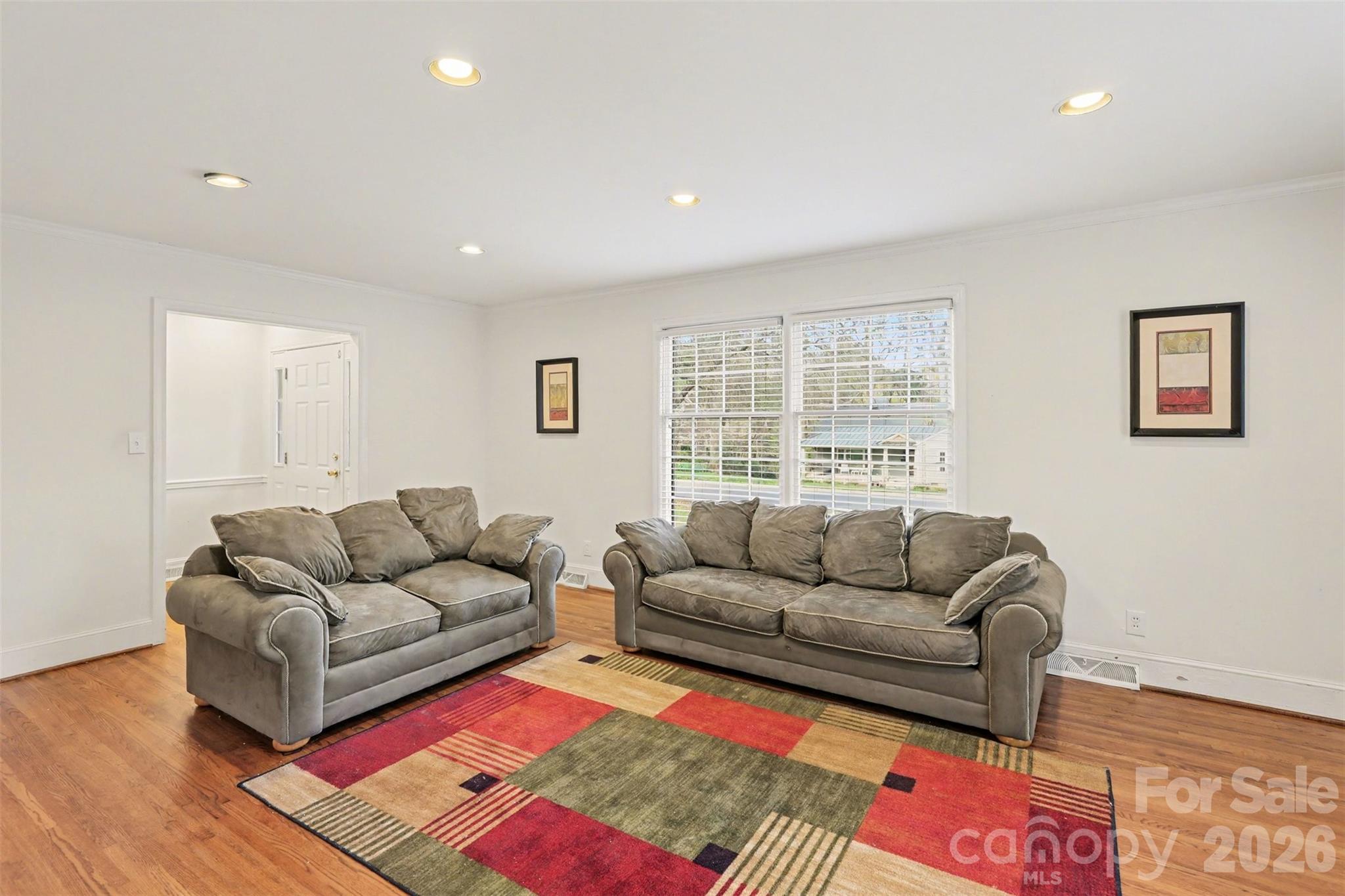 3101 Eastburn Road Charlotte, NC 28210 - Photo 4 of 31 a living room with furniture and a couch
