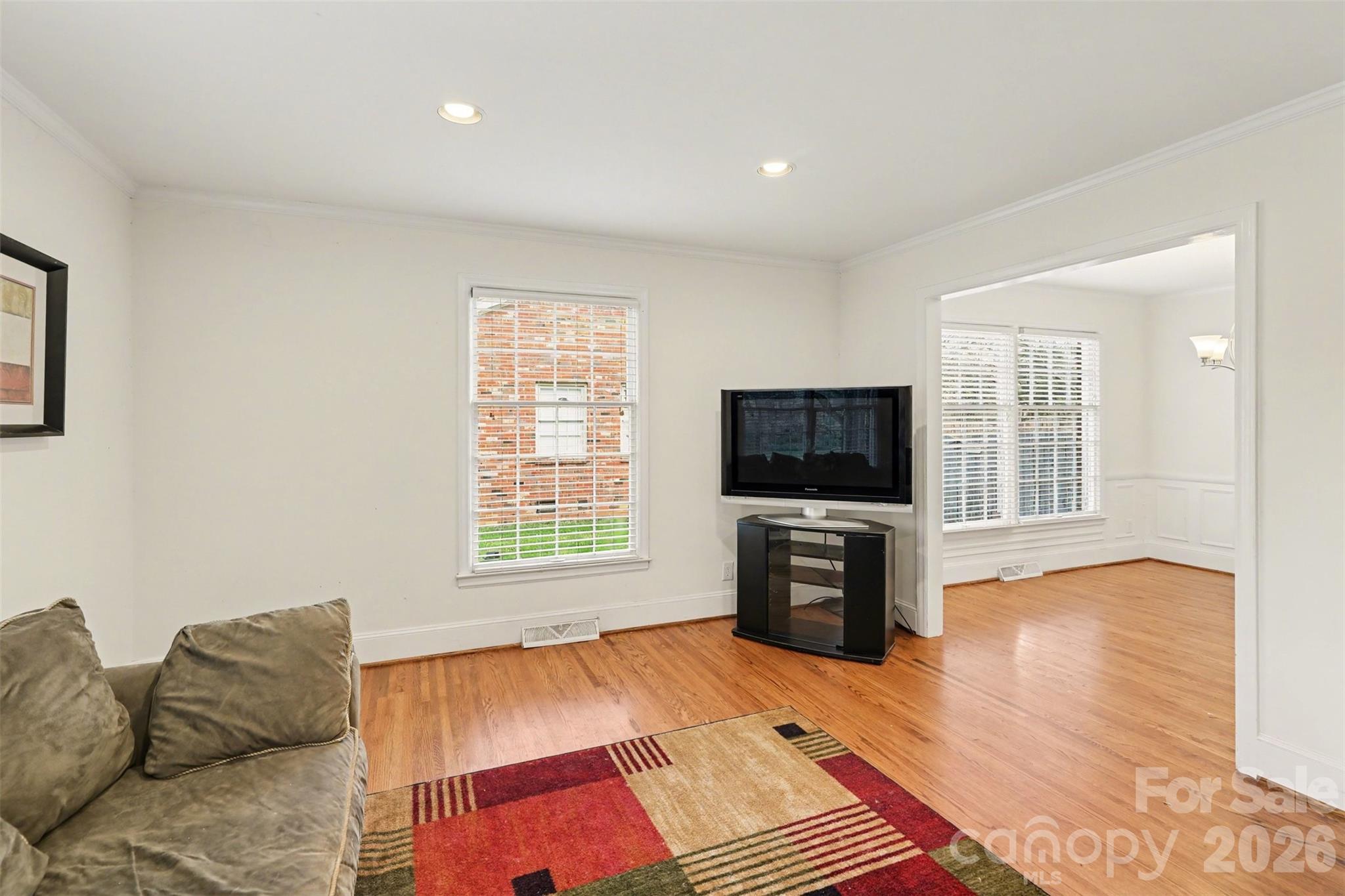 3101 Eastburn Road Charlotte, NC 28210 - Photo 5 of 31 a living room with furniture and a flat screen tv