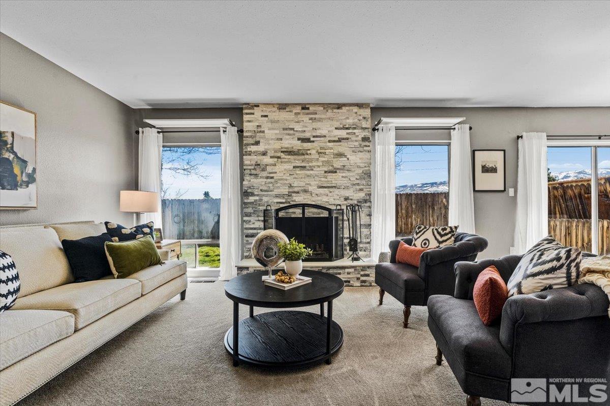 1840 Ribeiro Circle Reno, NV 89503 - Photo 5 of 32 a living room with furniture and a fireplace