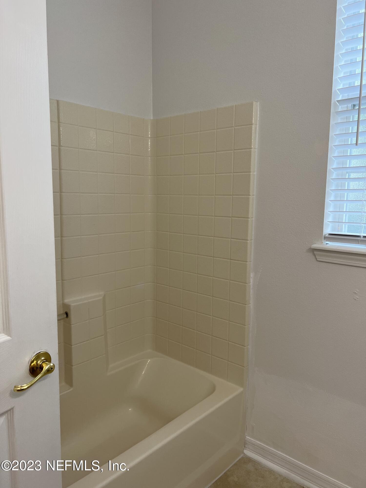 7990 Baymeadows Road East, Unit 418 Jacksonville, FL 32256 - Photo 19 of 25 a close up of a bathtub