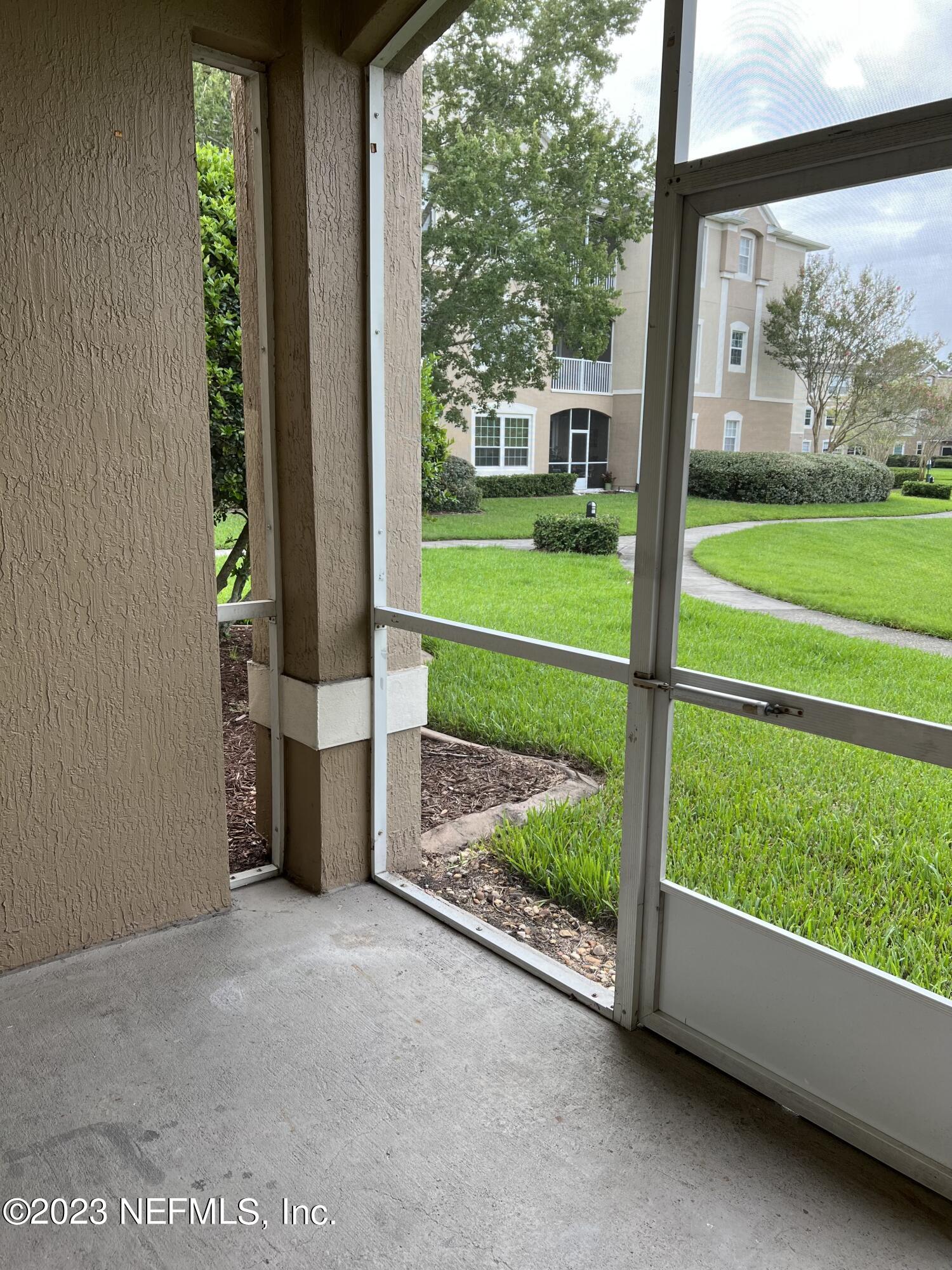 7990 Baymeadows Road East, Unit 418 Jacksonville, FL 32256 - Photo 23 of 25 a view of outdoor space and garden