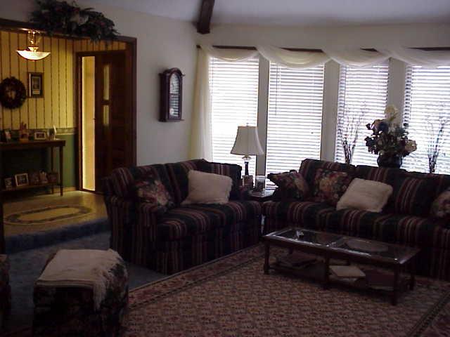 8109 Lamount Drive Amarillo, TX 79110 - Photo 3 of 8 a living room with furniture and a window