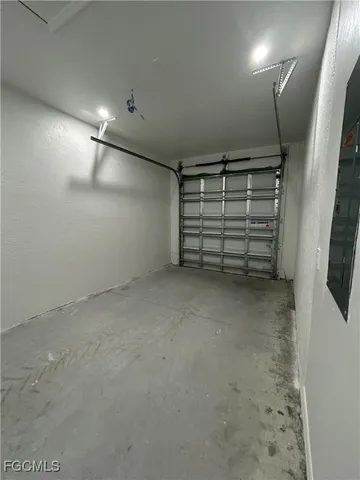 a view of empty room with stairs