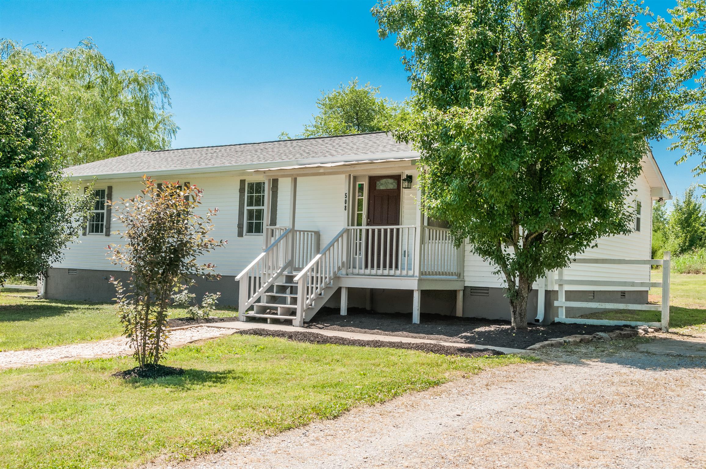 508 Curd Road Mount Juliet, TN 37122 - Photo 1 of 14 a front view of a house with a yard