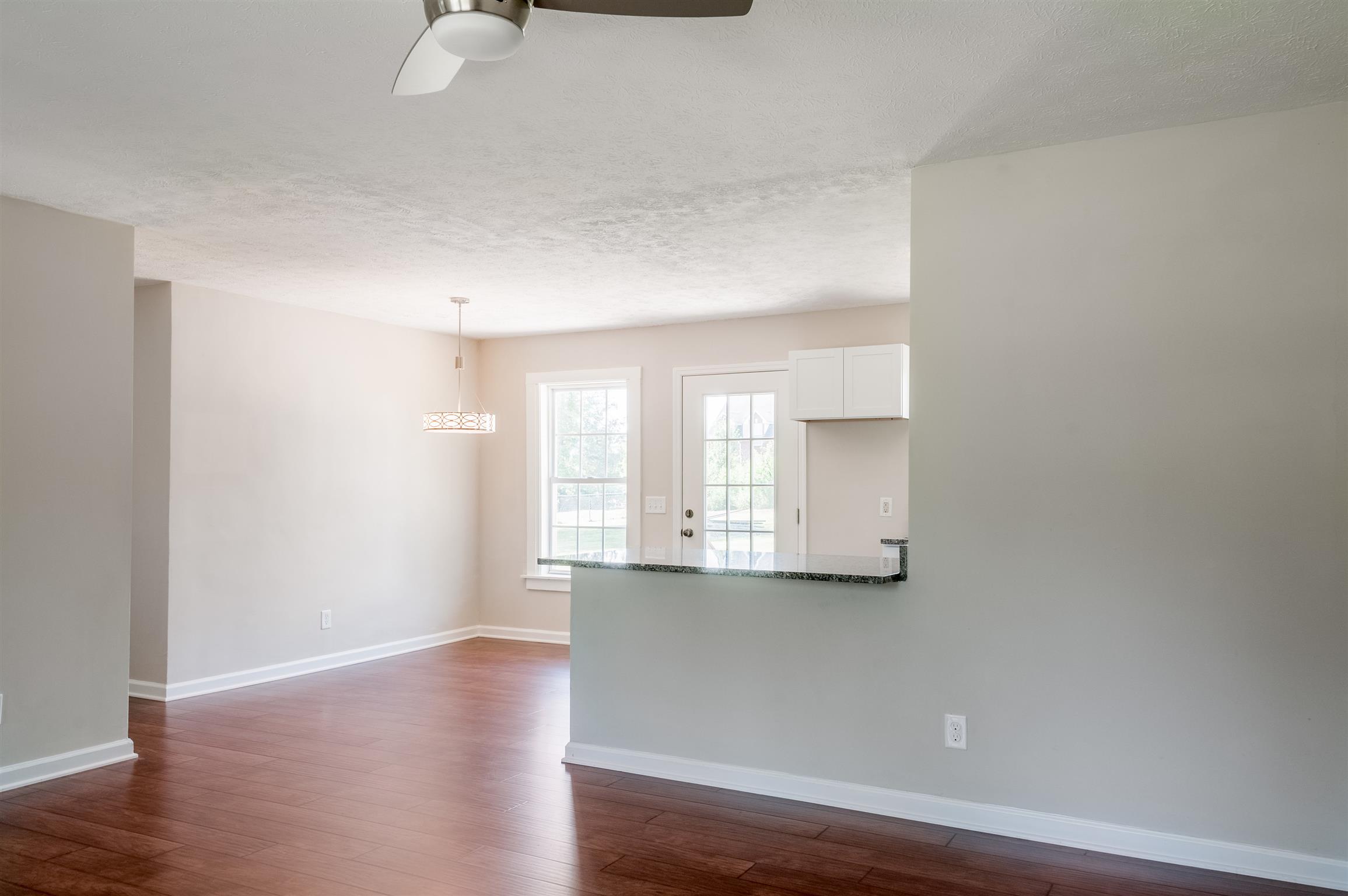 508 Curd Road Mount Juliet, TN 37122 - Photo 5 of 14 an empty room with wooden floor and windows