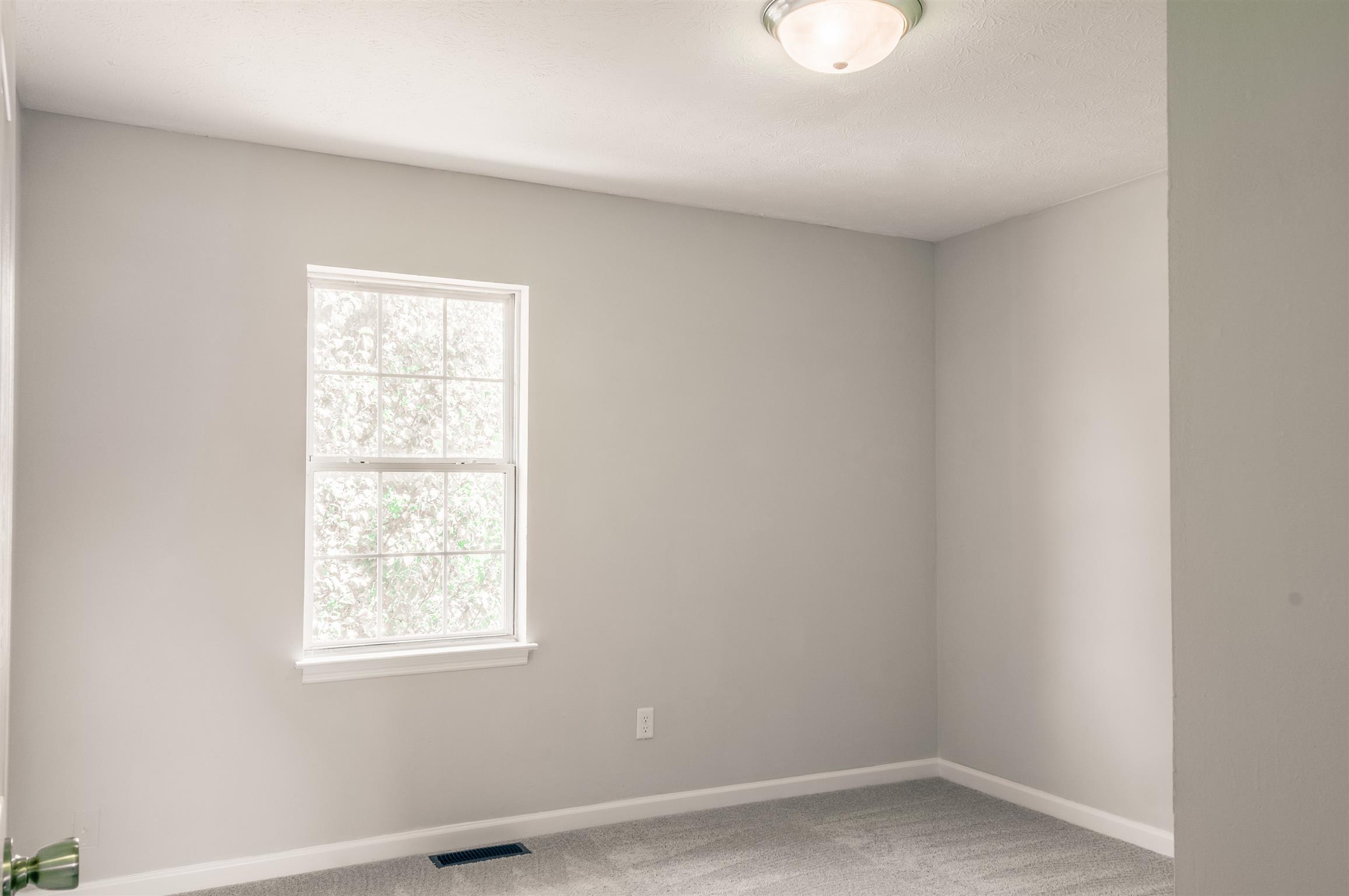 508 Curd Road Mount Juliet, TN 37122 - Photo 8 of 14 an empty room with a window