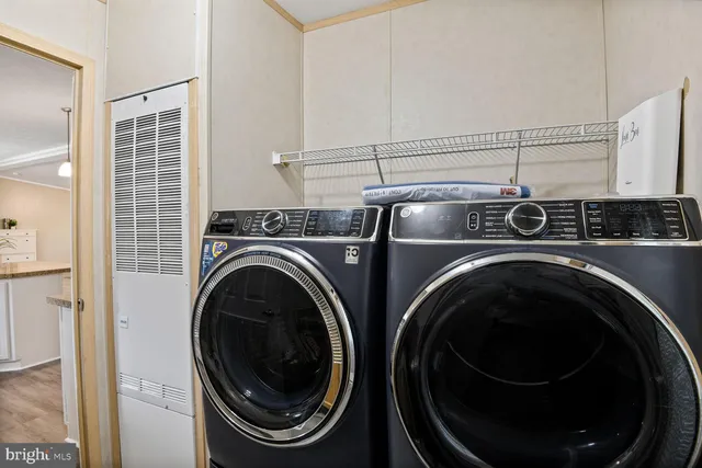 a utility room with dryer and washer