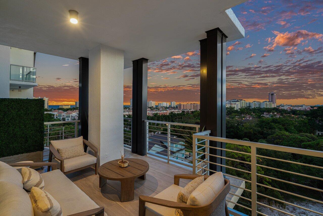 475 East Royal Palm Road, Unit 805 Boca Raton, FL 33432 - Photo 30 of 41 a living room with furniture and a floor to ceiling window