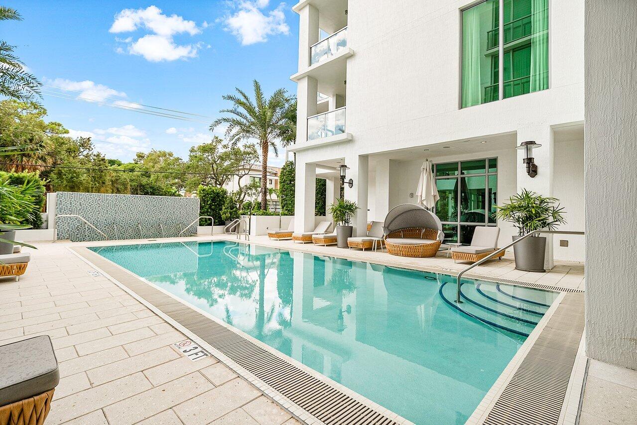 475 East Royal Palm Road, Unit 805 Boca Raton, FL 33432 - Photo 40 of 41 a view of a house with pool and sitting area