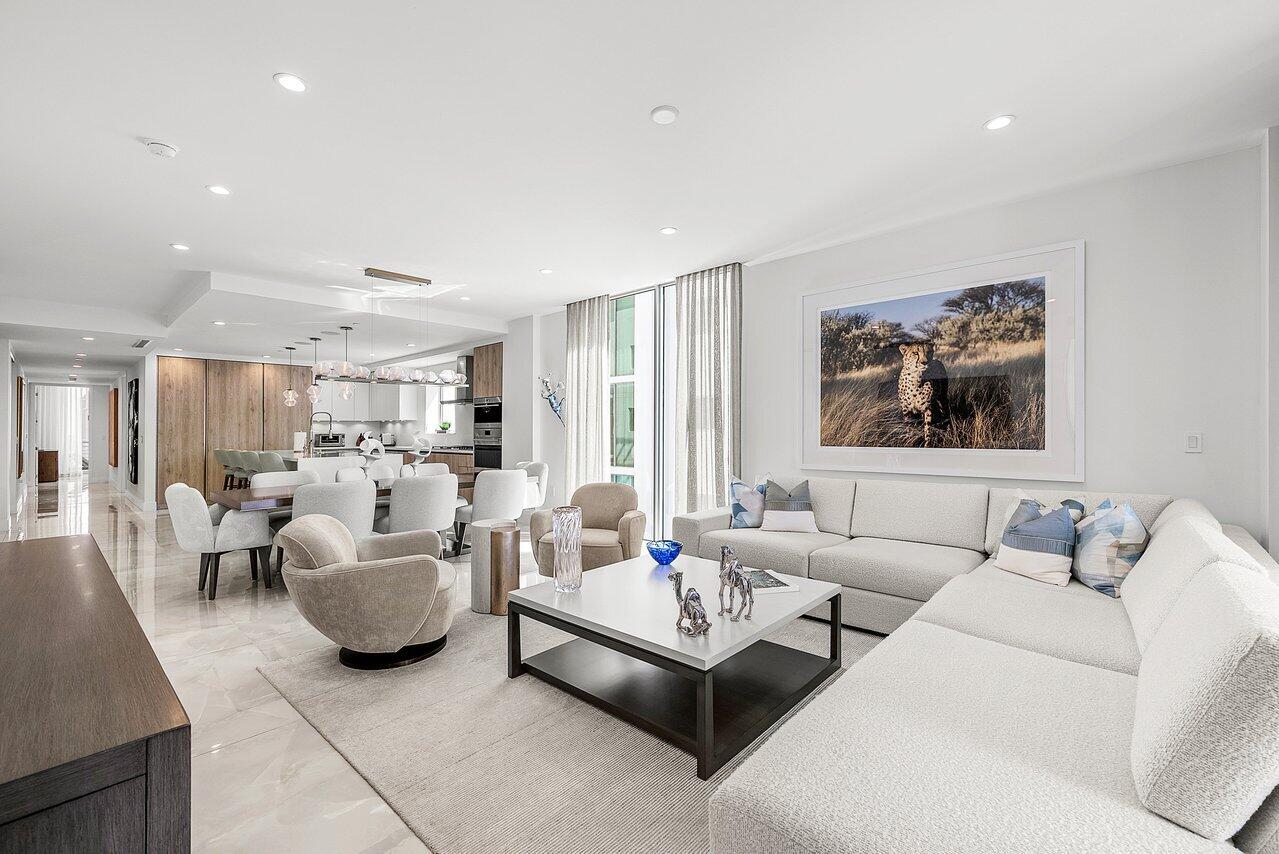 475 East Royal Palm Road, Unit 805 Boca Raton, FL 33432 - Photo 10 of 41 a living room with furniture and a large window