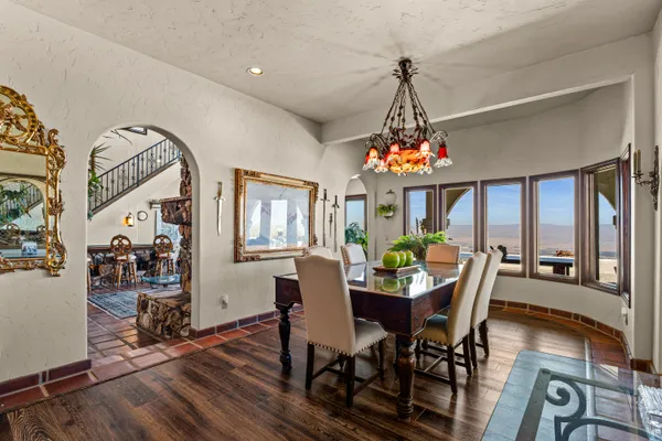 a view of balcony with wooden floor and city view