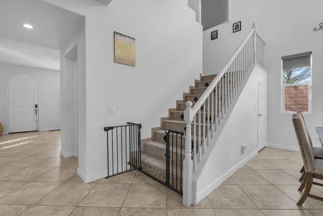 a view of kitchen with furniture and wooden floor